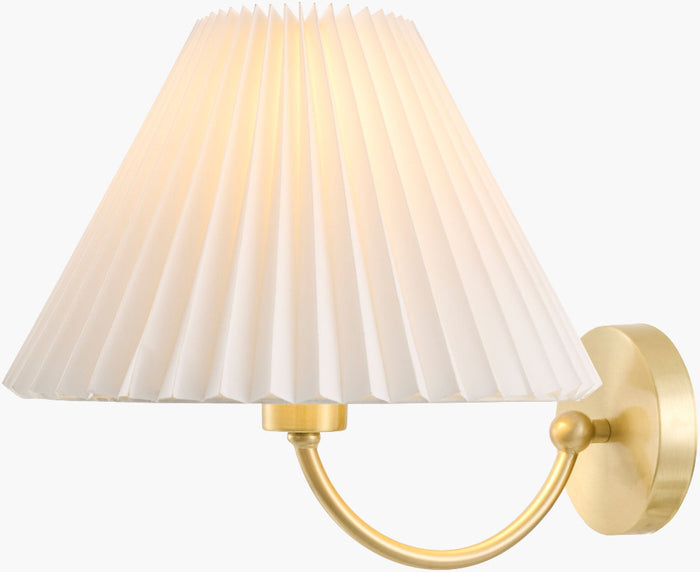 Wall-mounted lamp with pleated white shade and gold fixture on a white background