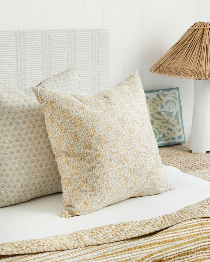 Kumasi Elm Pillow Cover on bed