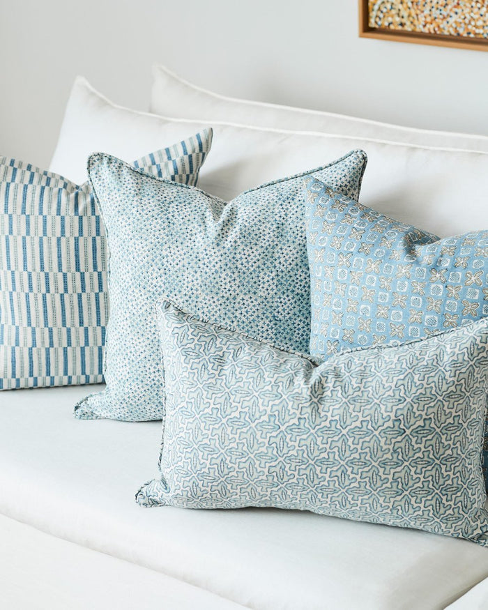 Hanko Tahoe Pillow Cover styled on sofa with Calais Tahoe Pillow Cover