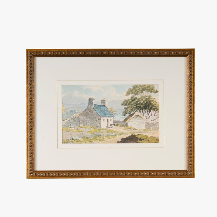 Hillside Cottage Framed Print with gold frame