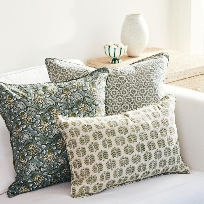 Hera Moss Celadon Lumbar Pillow Cover on sofa with Iznik Moss
