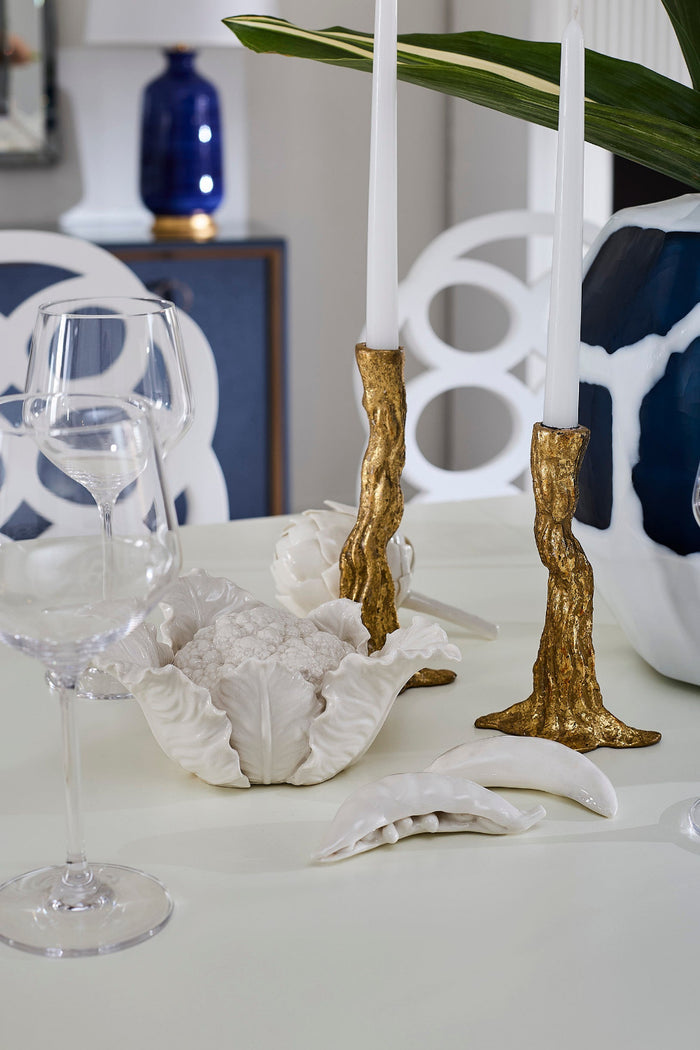 Mixed Veggies Blanc de Chine Objects on dining table with gold candle holders
