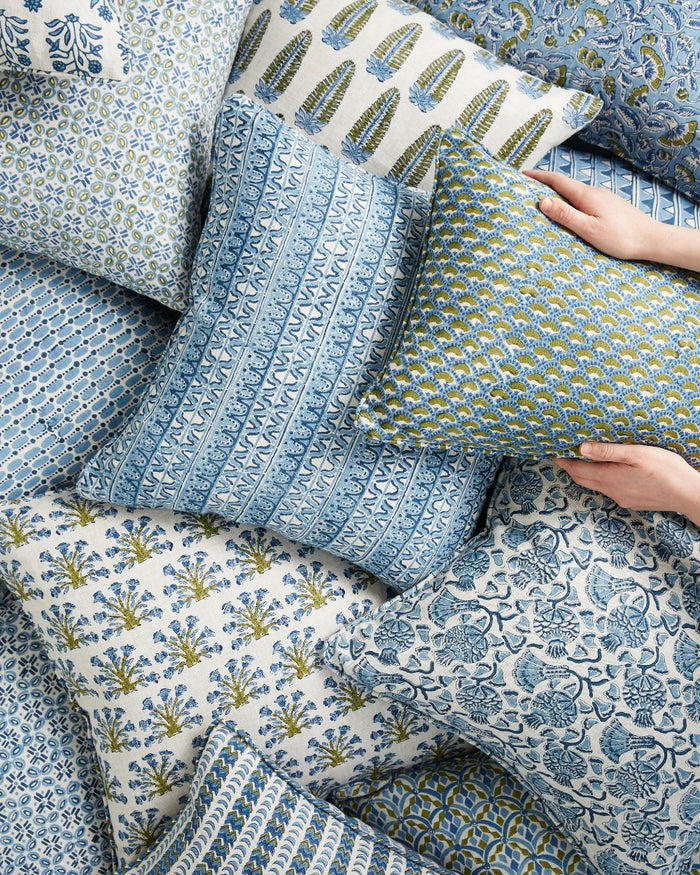 Samode Moss Azure Pillow Cover in pile of block print pillows