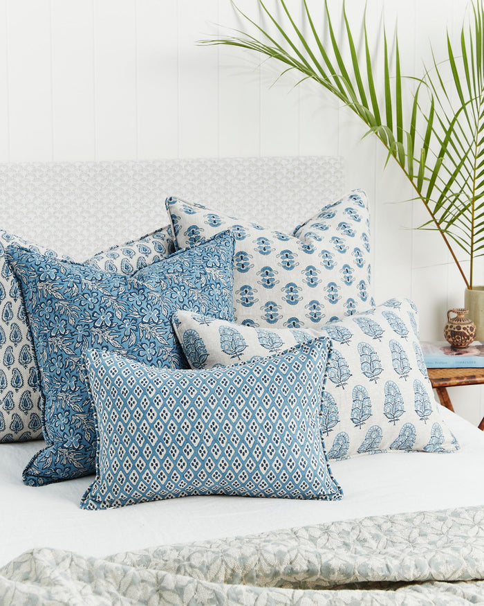 Orvietto Azure Lumbar Pillow Cover and Sundara Azure Pillow Cover styled on bed