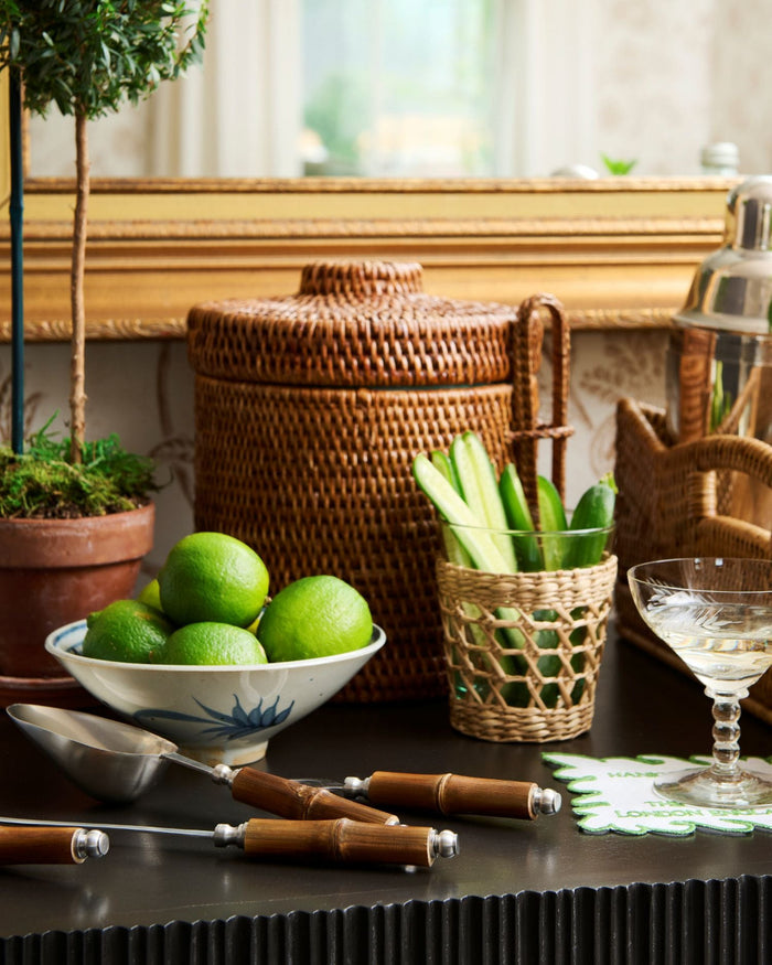 Woven Rattan Ice Bucket styled with bamboo bar tools